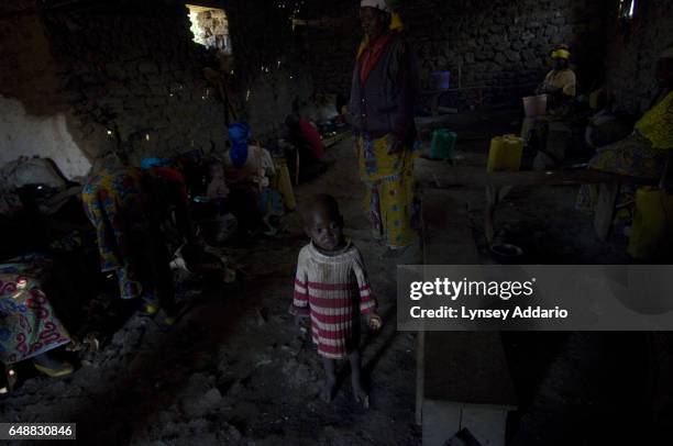 Displaced Congolese sit in a makeshift shelter at a church in Rugari, North Kivu province, Democratic Republic of Congo on Dec. 6, 2007. Many...