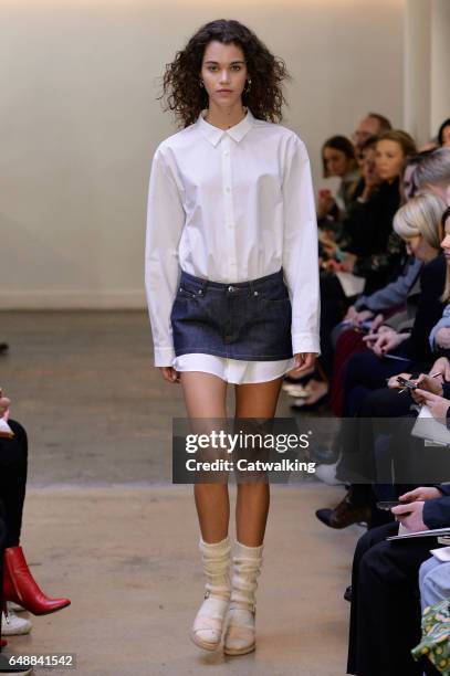 Model walks the runway at the A.P.C. Autumn Winter 2017 fashion show during Paris Fashion Week on March 6, 2017 in Paris, France.