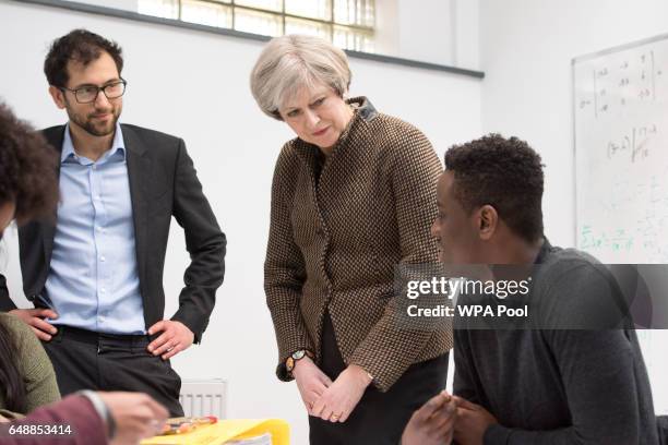 Prime Minister, Theresa May talks with students in a mathematics class during a visit to King's College London Mathematics School on March 6, 2017 in...