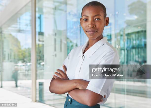 portrait of a young african businesswomen. - short sleeve work shirt stock pictures, royalty-free photos & images