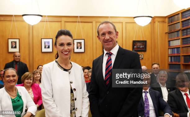 In this handout provided by the New Zealand Labour Party, Jacinda Ardern and Andrew Little pose for a photo after Ardern was confirmed as Labour's...