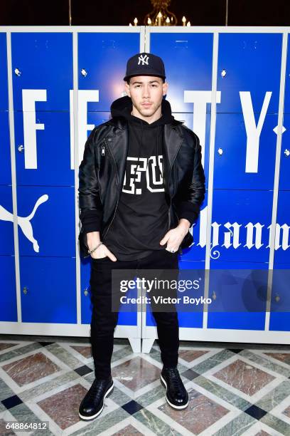 Nick Jonas attends FENTY PUMA by Rihanna Fall / Winter 2017 Collection at Bibliotheque Nationale de France on March 6, 2017 in Paris, France.