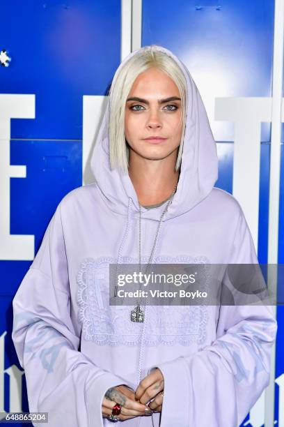 Cara Delevingne attends FENTY PUMA by Rihanna Fall / Winter 2017 Collection at Bibliotheque Nationale de France on March 6, 2017 in Paris, France.