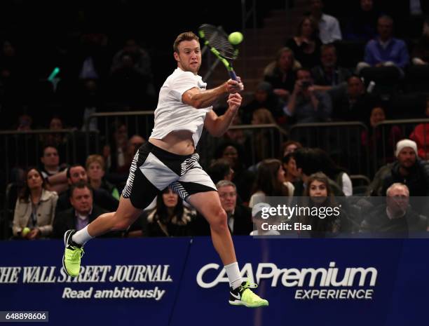 Jack Sock of Team Americas returns a shot against Nick Kyrgios of Team World in their Men's Singles match during the BNP Paribas Showdown at Madison...