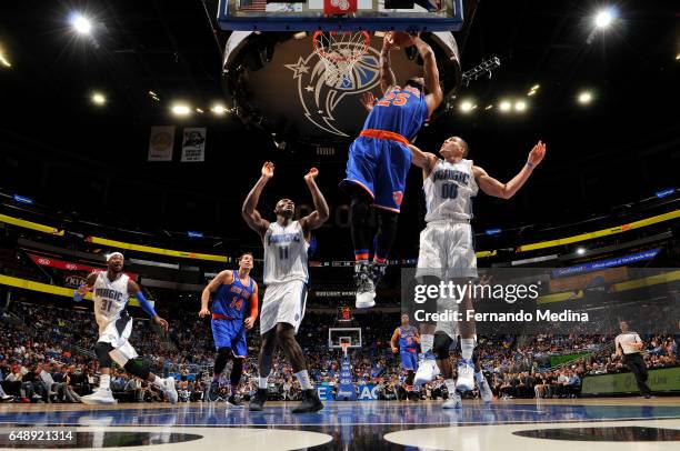 Derrick Rose of the New York Knicks dunks against the Orlando Magic during the game on March 6, 2017 at Amway Center in Orlando, Florida. NOTE TO...