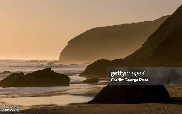 The coastline at Gaviota Beach is silhouetted against a setting sun on December 28 in Gaviota State Park, California. Because of its close proximity...