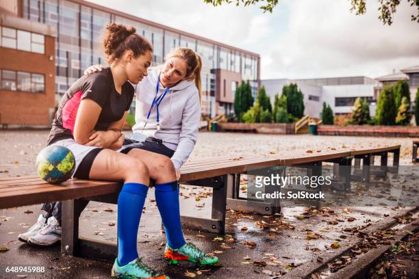 supporting her rugby players - coach stock pictures, royalty-free photos & images