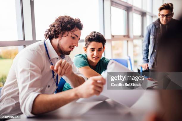 trabajo de la gran escuela - tutor fotografías e imágenes de stock