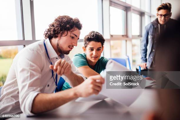 great school work - males stock pictures, royalty-free photos & images