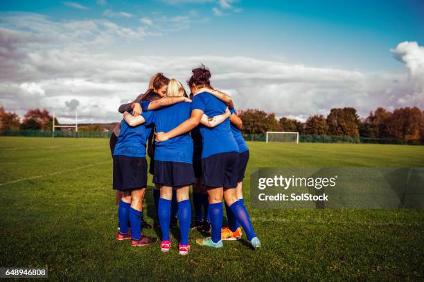 team group together - girls sports team stock pictures, royalty-free photos & images