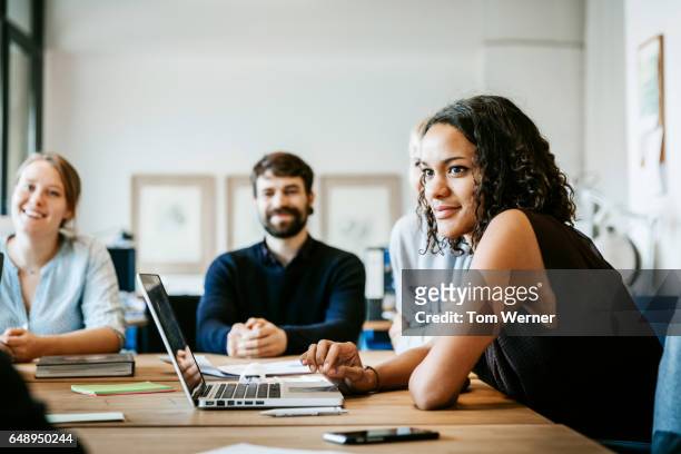 start up business people during a kick off meeting - young adult stock pictures, royalty-free photos & images