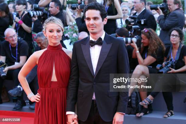 Olivia Hamilton and director Damien Chazelle during 73rd International Art Exhibition of Venice Film Festival. A red carpet of the film La La Land.