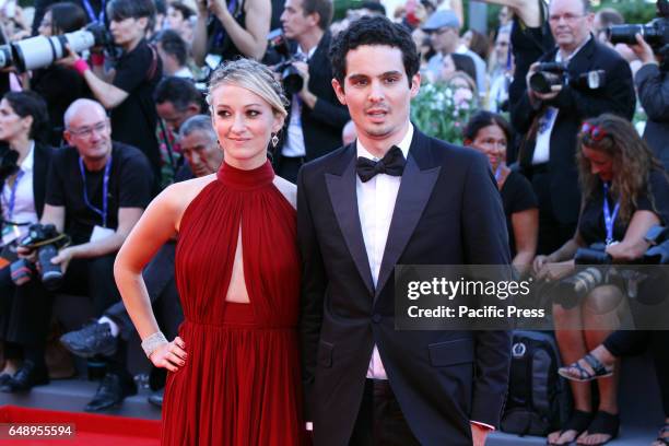 Olivia Hamilton and director Damien Chazelle during 73rd International Art Exhibition of Venice Film Festival. A red capet of the film La La Land.