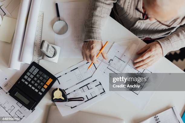 top view of old man architect - calculator top view stock pictures, royalty-free photos & images