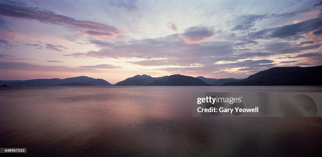 Loch Linnhe at sunset with pink clouds