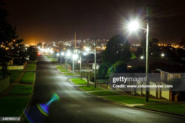 australian suburbs at night - neighborhood street light stock pictures, royalty-free photos & images