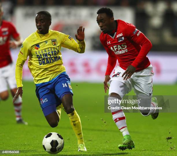 Ridgeciano Haps of AZ Alkmaar gets past the tackle from Jamiro Monteiro of SC Cambuur during the Dutch KNVB Cup Semi-final match between AZ Alkmaar...