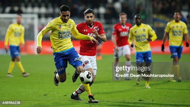 Marvin Peersman of SC Cambuur battles for the ball with Alireza Jahanbakhsh of AZ Alkmaar during the Dutch KNVB Cup Semi-final match between AZ...