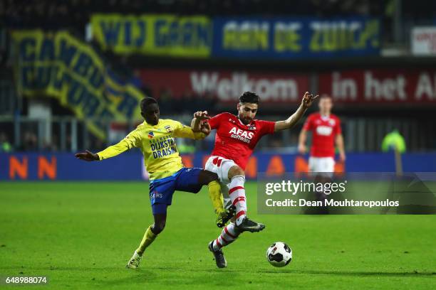 Jamiro Monteiro of SC Cambuur battles for the ball with Alireza Jahanbakhsh of AZ Alkmaar during the Dutch KNVB Cup Semi-final match between AZ...