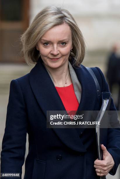 British Lord Chancellor and Justice Secretary Liz Truss arrives at Downing Street in London on March 7, 2017. - British Prime Minister Theresa May is...