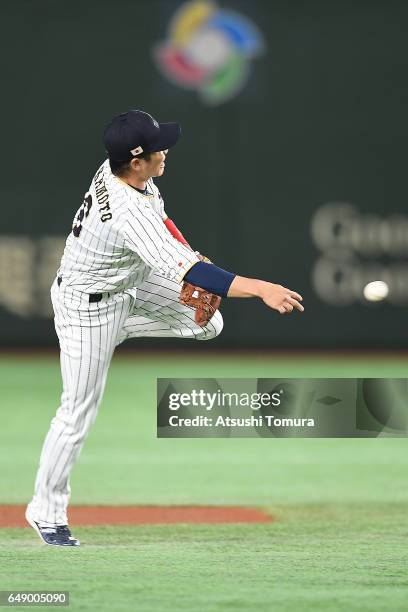 Hayato Sakamoto of Japan throws in the first inning of the World Baseball Classic Pool B Game One between Cuba and Japan at Tokyo Dome on March 7,...