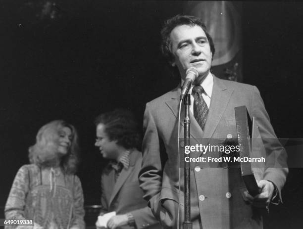 American theatre impresario Joe Papp speaks at the Village Voice's annual OBIE Awards , New York, New York, May 21, 1973. Behind him is the event's...