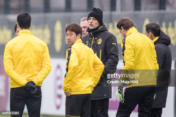 Head coach Thomas Tuchel of Dortmund talks to the team during the training of Borussia Dortmund ahead of the UEFA Champions League Round of 16 second...