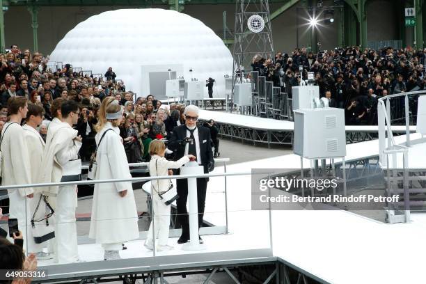 Stylist Karl Lagerfeld and his Godson Hudson Kroenig walk the runway at the end of the Chanel show as part of the Paris Fashion Week Womenswear...