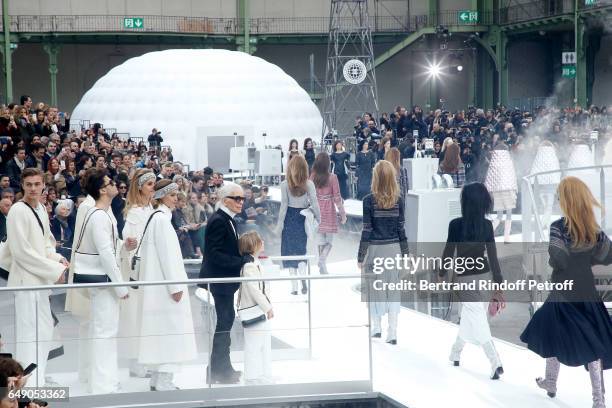 Stylist Karl Lagerfeld and his Godson Hudson Kroenig walk the runway at the end of the Chanel show as part of the Paris Fashion Week Womenswear...