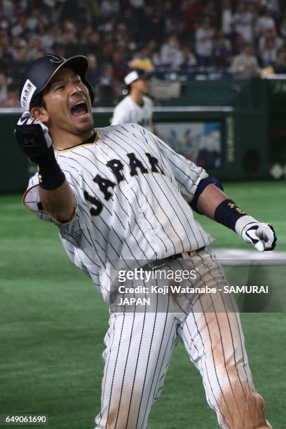 Infielder Nobuhiro Matsuda of Japan celebrates after hitting a three-run homer to make it 6-1 in the bottom of the fifth inning during the World...