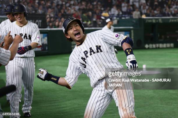 Infielder Nobuhiro Matsuda of Japan celebrates after hitting a three-run homer to make it 6-1 in the bottom of the fifth inning during the World...