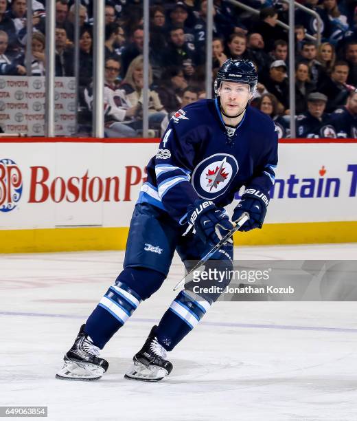 Paul Postma of the Winnipeg Jets keeps an eye on the play during second period action against the St. Louis Blues at the MTS Centre on March 3, 2017...