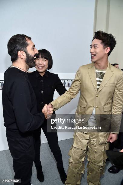 Giambattista Valli,Angelica Cheung and Timmy Xu attend the Moncler Gamme Rouge show as part of the Paris Fashion Week Womenswear Fall/Winter...