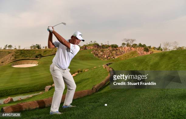Danny Chia of Malaysia plays on the 17th hole during practice prior to the start of the Hero Indian Open at Dlf Golf and Country Club on March 7 2017...