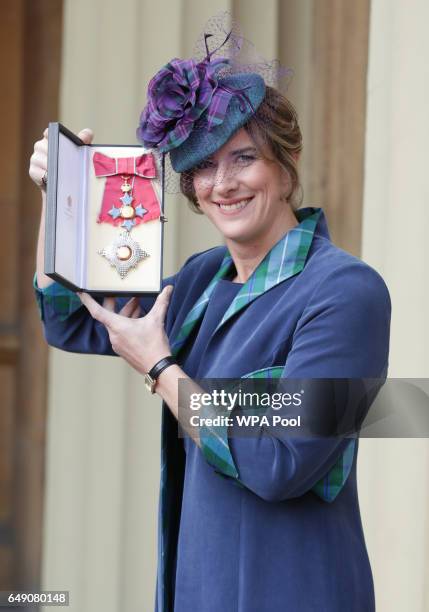Rower Dame Katherine Grainger after she was made a Dame Commander by Queen Elizabeth II during an Investiture ceremony at Buckingham Palace, on March...