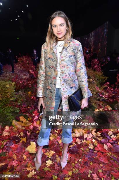 Guest attends the Moncler Gamme Rouge show as part of the Paris Fashion Week Womenswear Fall/Winter 2017/2018 on March 7, 2017 in Paris, France.