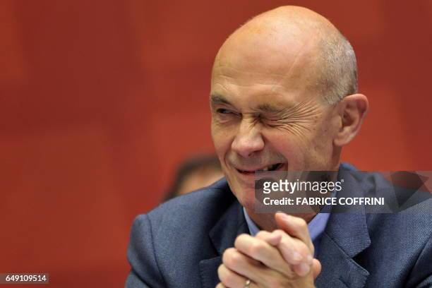 World Trade Organization French Director-General Pascal Lamy blinks to outgoing European Trade Commissioner Catherine Ashton as she left the podium...