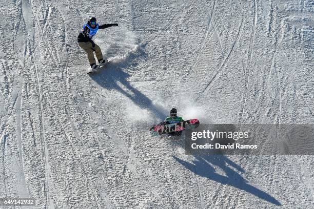 Athletes make a run during slopestyle training during previews of the FIS Freestyle Ski & Snowboard World Championships 2017 on March 7, 2017 in...