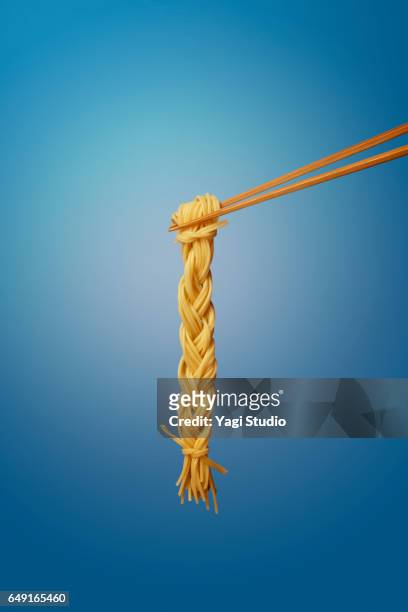 fork and braided pasta - 箸 ストックフォトと画像