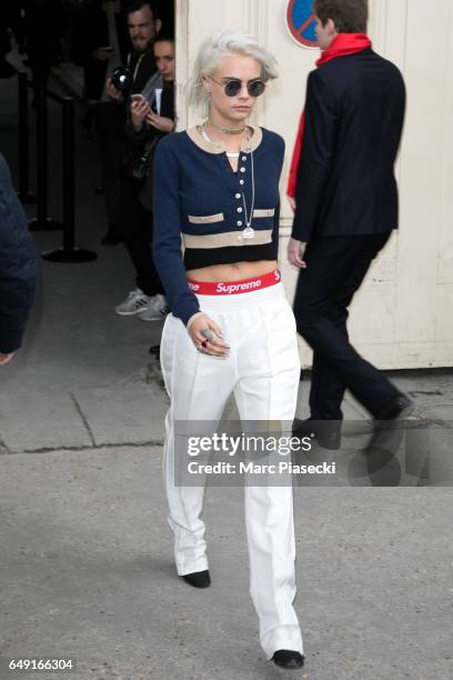 Model Cara Delevingne leaves the CHANEL show as part of the Paris Fashion Week Womenswear Fall/Winter 2017/2018 on March 7, 2017 in Paris, France.