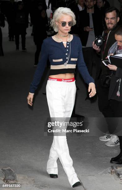 Model Cara Delevingne leaves the CHANEL show as part of the Paris Fashion Week Womenswear Fall/Winter 2017/2018 on March 7, 2017 in Paris, France.