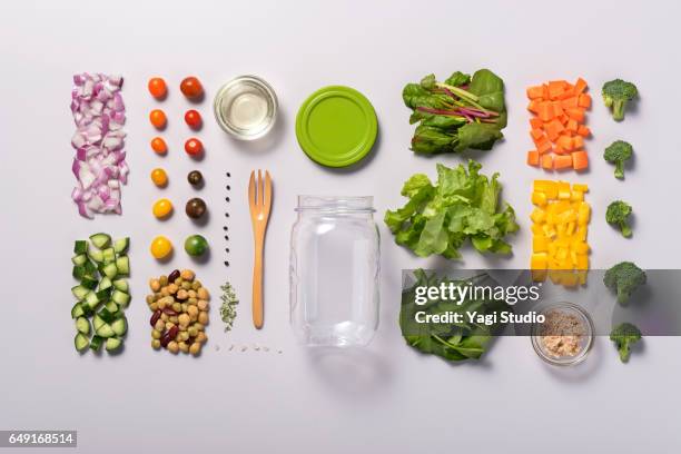 jar salad knolling style - broccoli white background stock-fotos und bilder