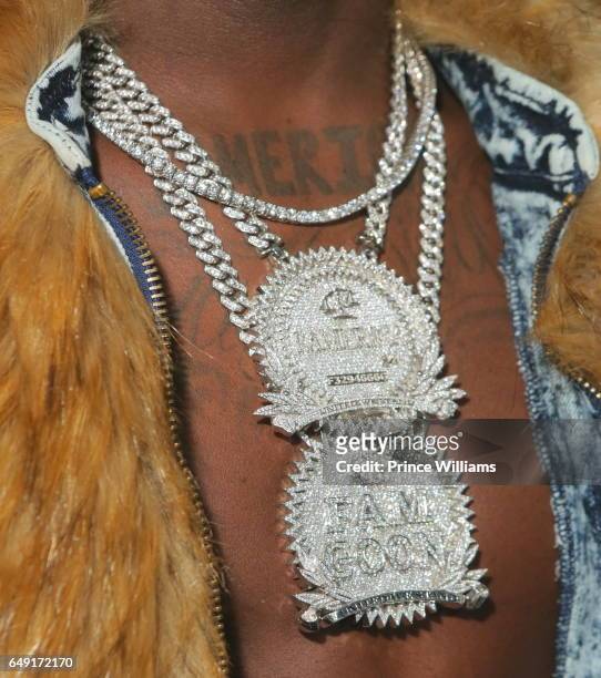Rapper Ralo, Jewelry Detail attends Ralo Signing Party Hosted By Gucci Mane at Josephine Lounge on March 6, 2017 in Atlanta, Georgia.