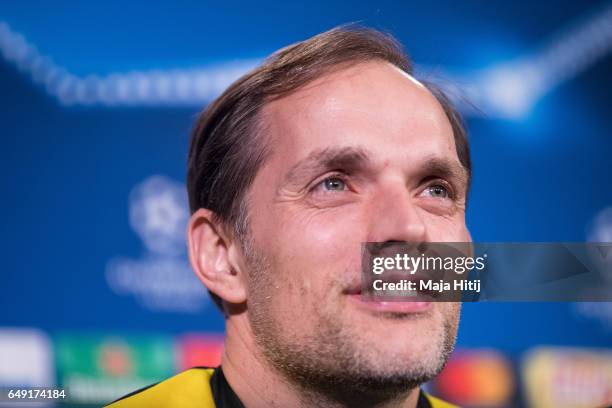 Head coach Thomas Tuchel of Dortmund smiles during a press conference prior the UEFA Champions League Round of 16 second leg match between Borussia...