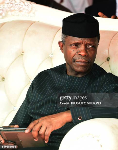 Nigeria's Acting President Yemi Osinbajo looks on during the ground breaking for the construction Lagos-Ibadan rail line project at the Ebute-Metta...