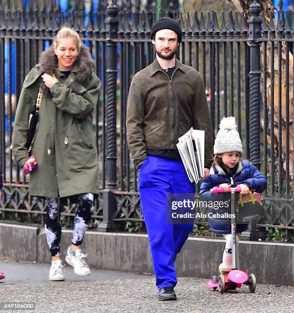 Sienna Miller,Tom Sturridge, Marlowe Ottoline Layng Sturridge are seen in the West Village on March 7, 2017 in New York City.