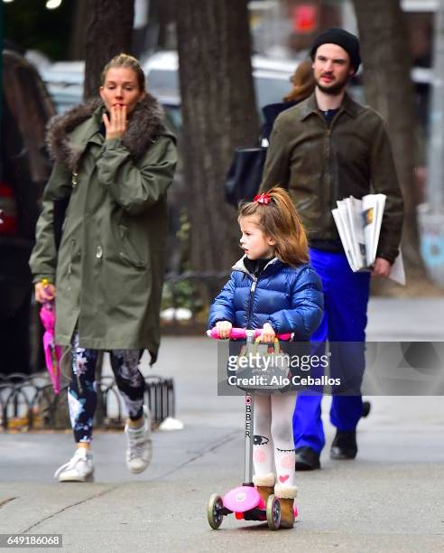 Sienna Miller,Tom Sturridge, Marlowe Ottoline Layng Sturridge are seen in the West Village on March 7, 2017 in New York City.