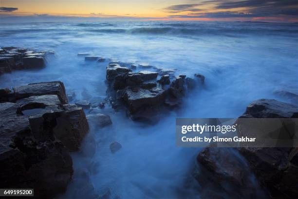 stunning seascape photograph at sunrise - high tide stock pictures, royalty-free photos & images