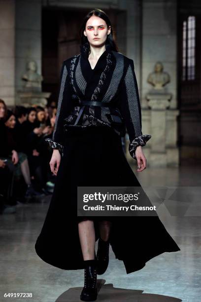 Model walks the runway during the Moon Young Hee show as part of the Paris Fashion Week Womenswear Fall/Winter 2017/2018 on March 7, 2017 in Paris,...