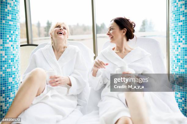 friends having wellness weekend - robe 2017 stock pictures, royalty-free photos & images